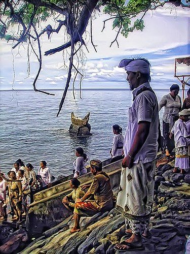 Pura Ponjok Batu coastal ritual area, Singaraja, Bali, with sacred stone boat offshore