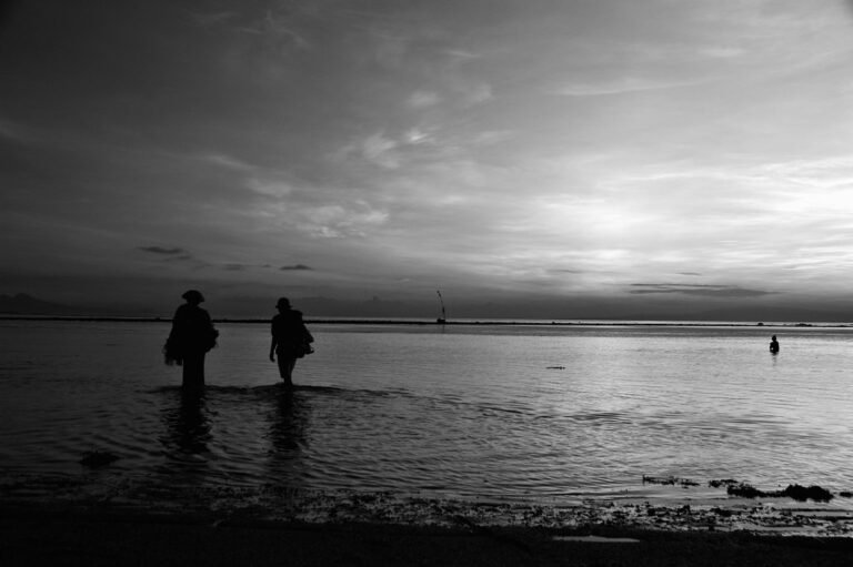 Fishing at sunrise on Sindhu Beach, Bali
