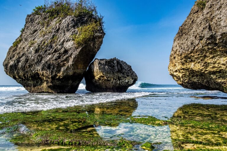 Rock formations and surf at Thomas Beach, Bali