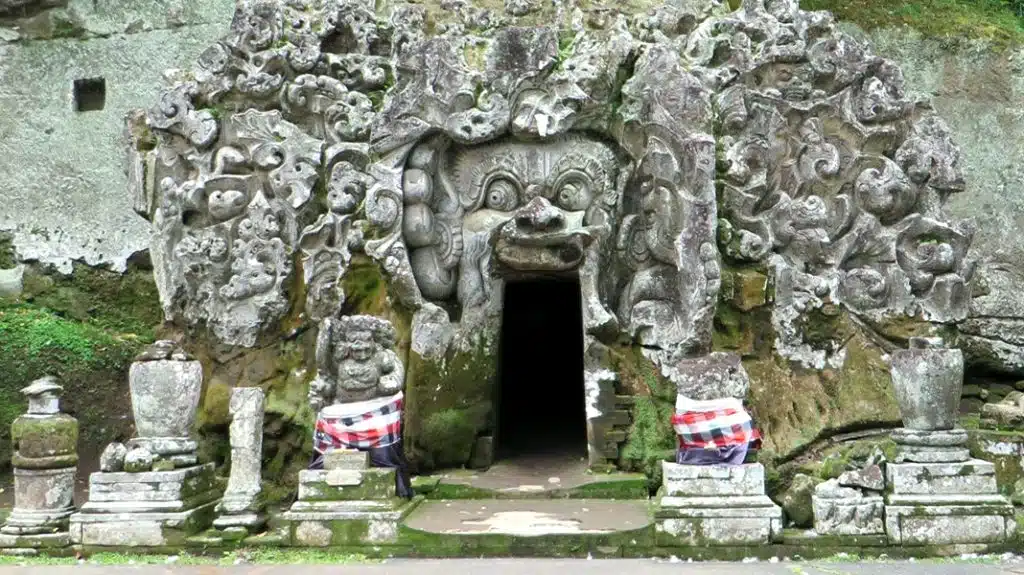 The iconic demon's mouth gateway at the Elephant Cave Temple in Bali.