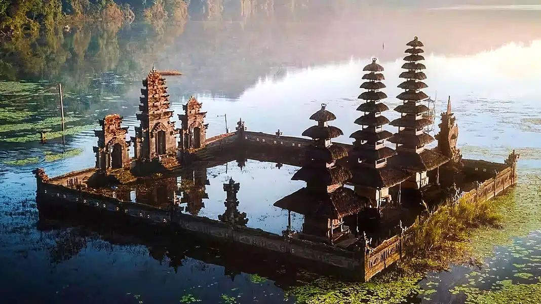 The serene Pura Ulun Danu Tamblingan Temple surrounded by misty lake waters